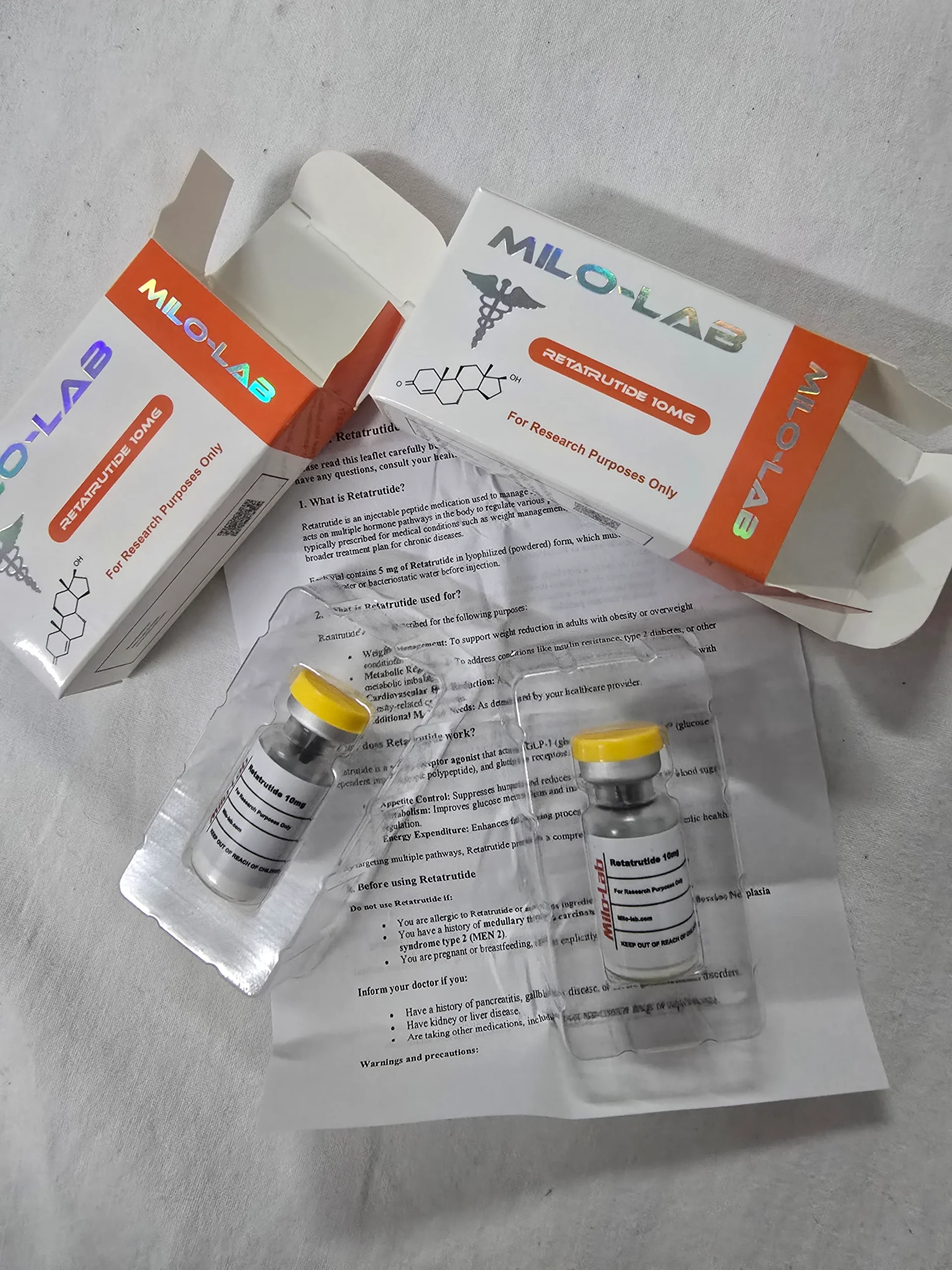 Retatrutide 10mg opened box with Retatrutide 